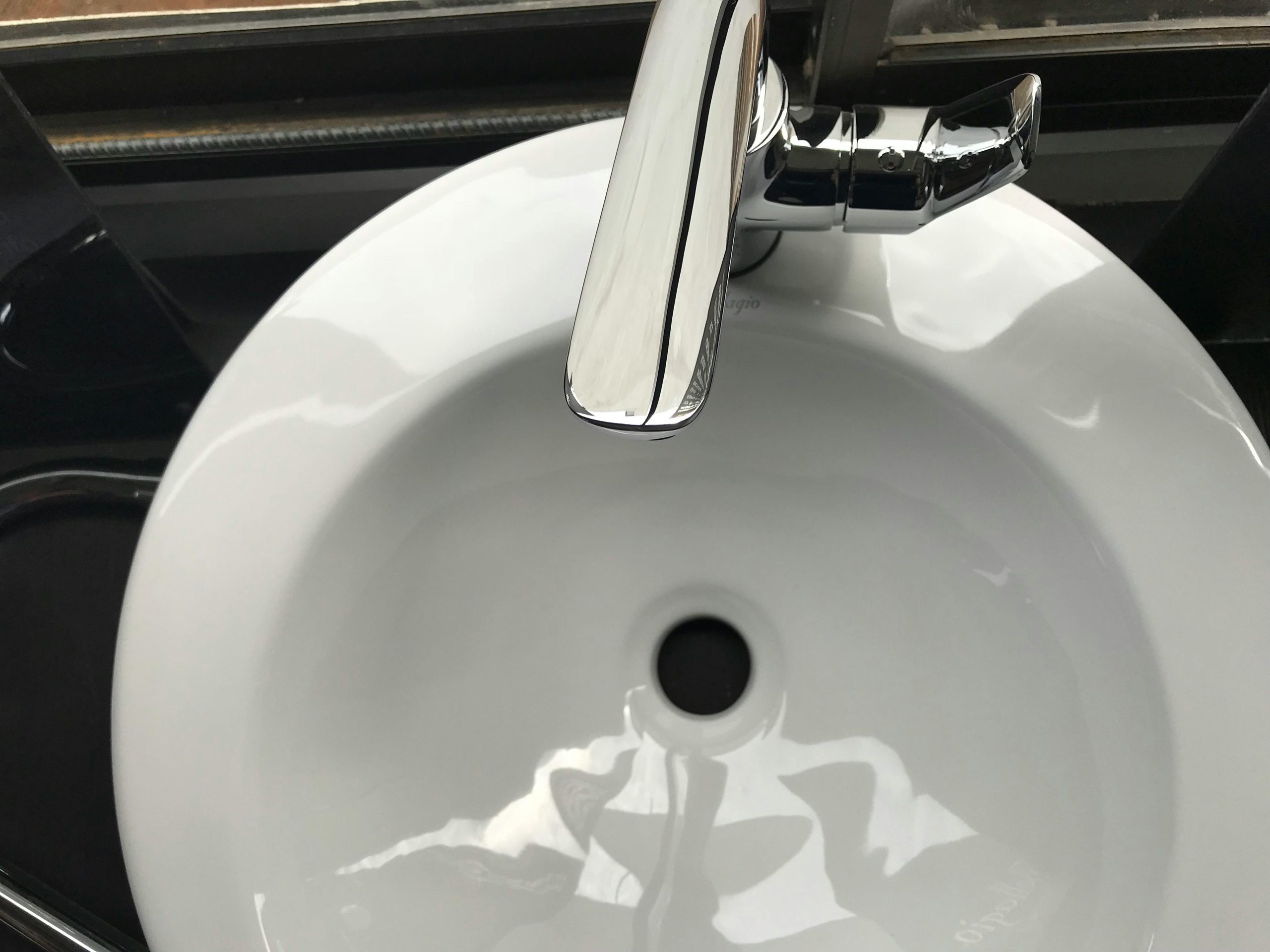 White sink with chrome faucet